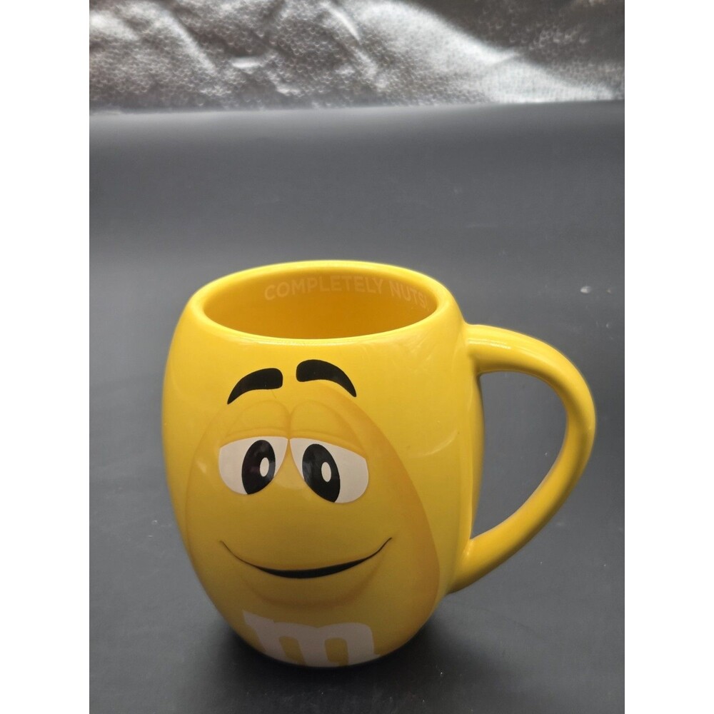 Yellow Peanut M & M Ceramic Mug Inside Completely Nuts